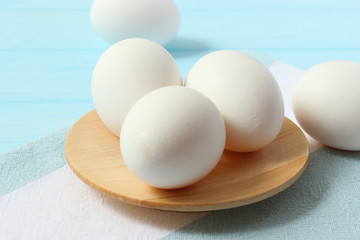 chicken eggs on a colored background. Farm products, natural eggs.