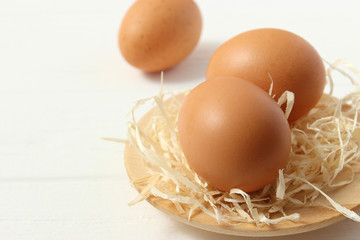 chicken eggs on the table. Farm products, natural eggs.
