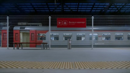 Train leaves empty station platform at airport