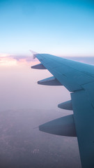 Plane wing air clouds. Transport, transportation. Holidays.