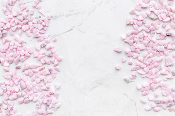 decorative pebble frame for design on marble background top view mockup