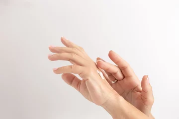 Poster hands of a woman applying ointment to herself on a clean environment.  Concept of  smooth skin, skincare, cosmetics, wellness center, healthy lifestyle © GC Fotoestudio