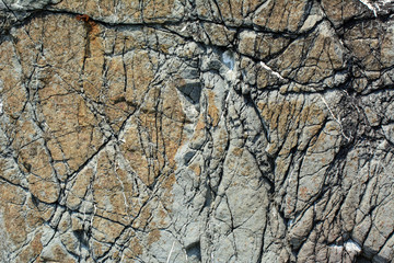 surface of stone rock in cracks