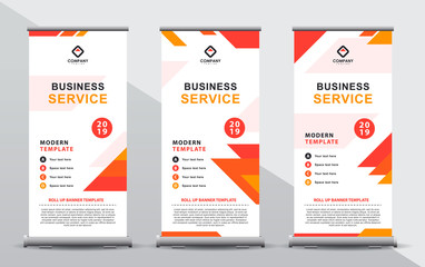 Set of three orange roll up banner template. Modern abstract geometric polygonal design composition with portrait presentation.