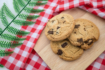 homemade chocolate chip cookies with red white napkin 