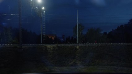 Freight cargo train moves past platform