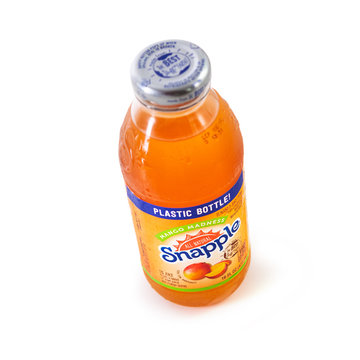 Saint Louis, MO . USA - 08.27.2019: Plastic Bottle Of Snapple Mango Madness Juice On White