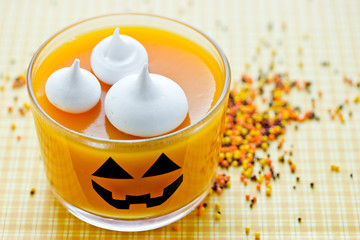 Pumpkin orange jelly or panna cotta in glass - fun and healthy idea for Halloween party dessert for...