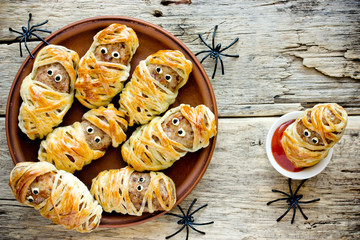Halloween mummies - meatballs wrapped in dough with funny eyes , funny idea for halloween party...