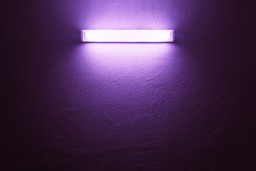 UV lamp on a rough wall.