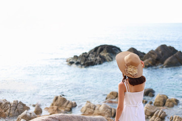 A beautiful broken heart women is alone and feel down on the beach.Valentine's concept.