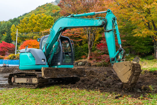 Excavators machine in park.
