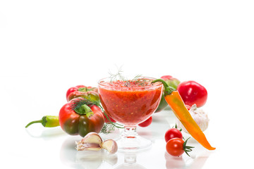 homemade hot adjika from tomatoes, hot and sweet peppers with spices