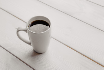Fototapeta na wymiar cup of black coffee