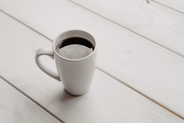 Fototapeta na wymiar cup of black coffee