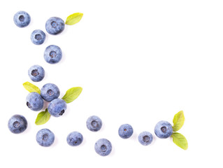 Blueberries with leaves isolated on white background, top view