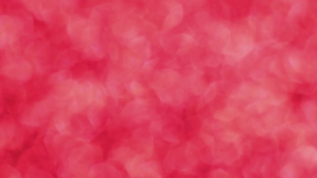 Red Merry Christmas magical bokeh lights background. Glamour happy valentines day walpaper.