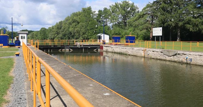 Erie Canal New York Palmyra 29 Lock gates control fence. Pioneer engineering wonder. 363 miles long man made waterway built in 1817. Transport of cargo from eastern ports and cities.
