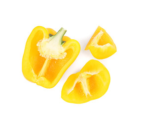 Cut yellow bell pepper isolated on white, top view