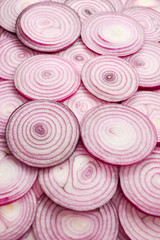 Onion slices as a background. Top view.