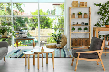 Modern living room interior with comfortable armchair