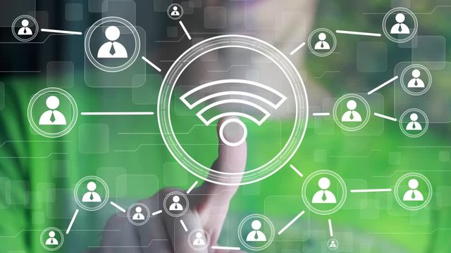 Businessman presses hand button wifi online network icon