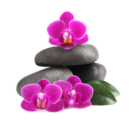 Fototapeta na wymiar Pile of spa stones and orchid flowers on white background