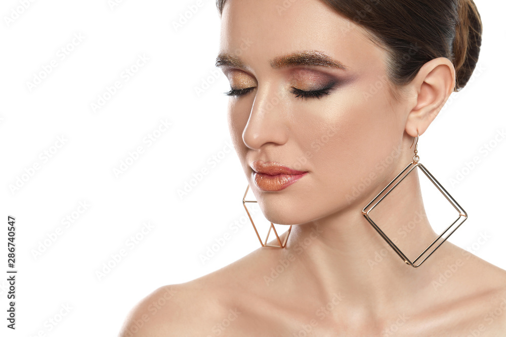 Poster Beautiful young woman with glitter makeup on white background