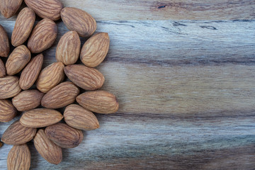 almonds on wooden background
