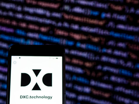 Kiev, Ukraine, November 30, 2018, illustrative editorial. DXC Technology Company logo seen displayed on smart phone..