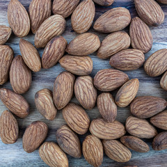 almonds on wooden background