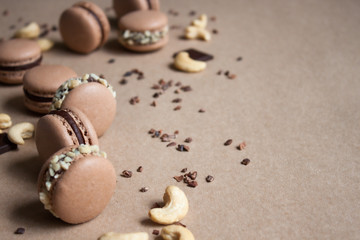 Fototapeta na wymiar Chocolate macarons background.