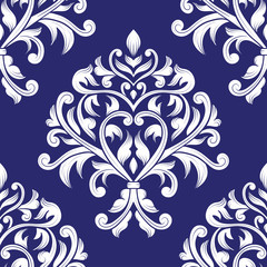 White and blue floral seamless pattern with decorative leaves. Traditional oriental motifs. Vintage ornament template. Paisley elements. Great for fabric and textile.