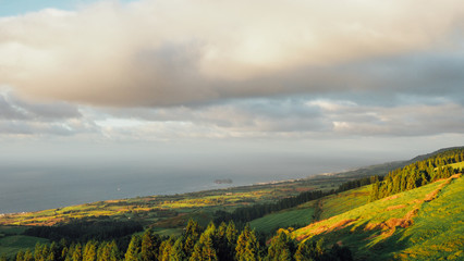 Naklejka premium Sunrise at Sao Jorge Island, seen from Castelo Branco at the Azores, Portugal