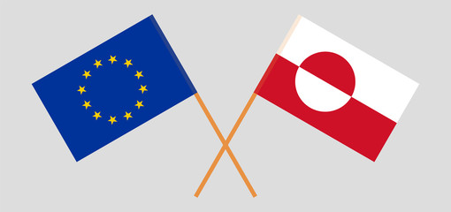 Greenland and the EU. Crossed Greenlandic and European flags © valyalkin