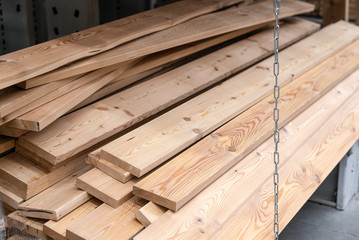 Timber on the shelf of construction shop.
