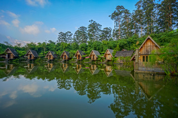Fototapeta na wymiar Small houses with terrace by the lake in Lembang, Indonesia