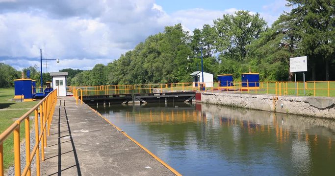 Erie Canal New York Palmyra 29 Lock gates inside control fence. Pioneer engineering wonder. 363 miles long man made waterway built in 1817. Transport of cargo from eastern ports and cities.