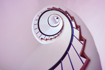 Looking up a spiral staircase