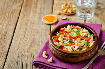 Cabbage red bell pepper carrot parsley cashews salad
