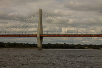 Cable-stayed bridge in Murom Russia across the Oka river on a summer cloudy day