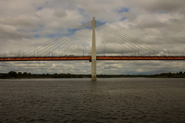Cable-stayed bridge in Murom Russia across the Oka river on a summer cloudy day