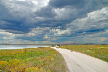 Steppe road along the estuary to the camp.