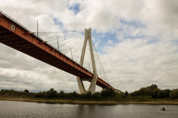 Cable-stayed bridge in Murom Russia across the Oka river on a summer cloudy day