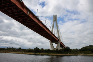Cable-stayed bridge in Murom Russia across the Oka river on a summer cloudy day