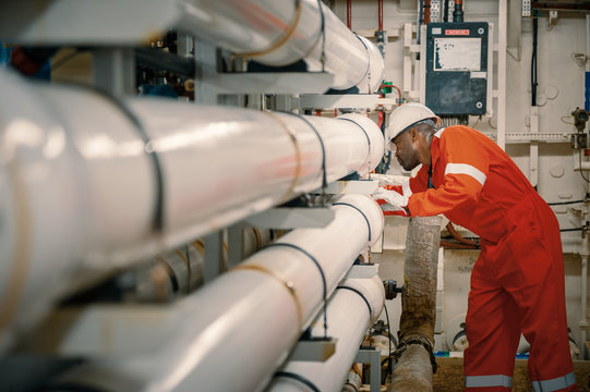 Employee on board FPSO working with concentration