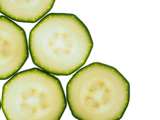 Slices zucchini isolated on white background