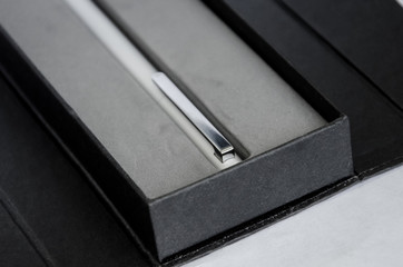 Fountain pen in a box on a white background