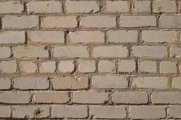 Old white brick. Brickwork. Old brickwork. The wall is built of white brick. Architectural texture. Silicate brick. Dirt on the wall.