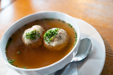 traditional austrian bacon dumpling soup from South Tyrol